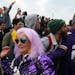 Vikings fan Molly Kreyer, of Prior Lake, walked through a crowd of hostile Eagle fans before kickoff of the NFC Championship game at Lincoln Financial