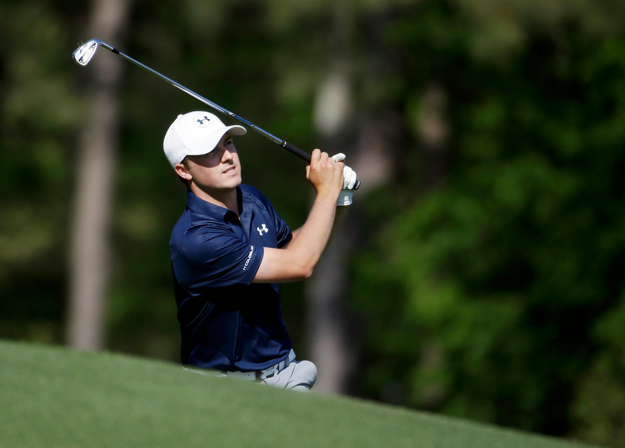 Jordan Spieth watches his tee shot on the 12th hole during the third round of the Masters golf tournament Saturday, April 12, 2014, in Augusta, Ga. (AP Photo/Darron Cummings)