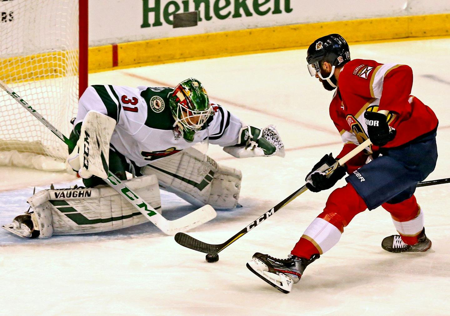 Wild goalie Kaapo Kahkonen stopped the Panthers' Vincent Trocheck in the first period Tuesday. Kahkonen made a team rookie record of 44 saves in the Wild's 4-2 victory.