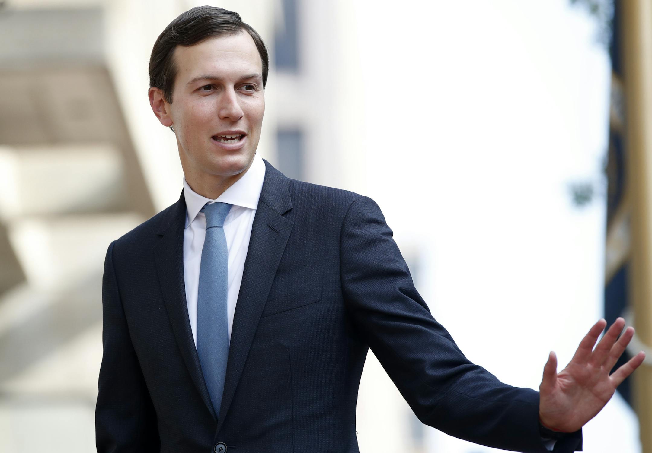 FILE - In this Aug. 29, 2018, file photo, White House Adviser Jared Kushner waves as he arrives at the Office of the United States Trade Representative in Washington. The Kushner family real estate firm has amassed over half a million dollars in unpaid fines for various New York City sanitation and building violations, much of that bill incurred while President Donald Trump's son-in-law and adviser Jared Kushner was running the company. (AP Photo/Jacquelyn Martin, File) ORG XMIT: NYR101