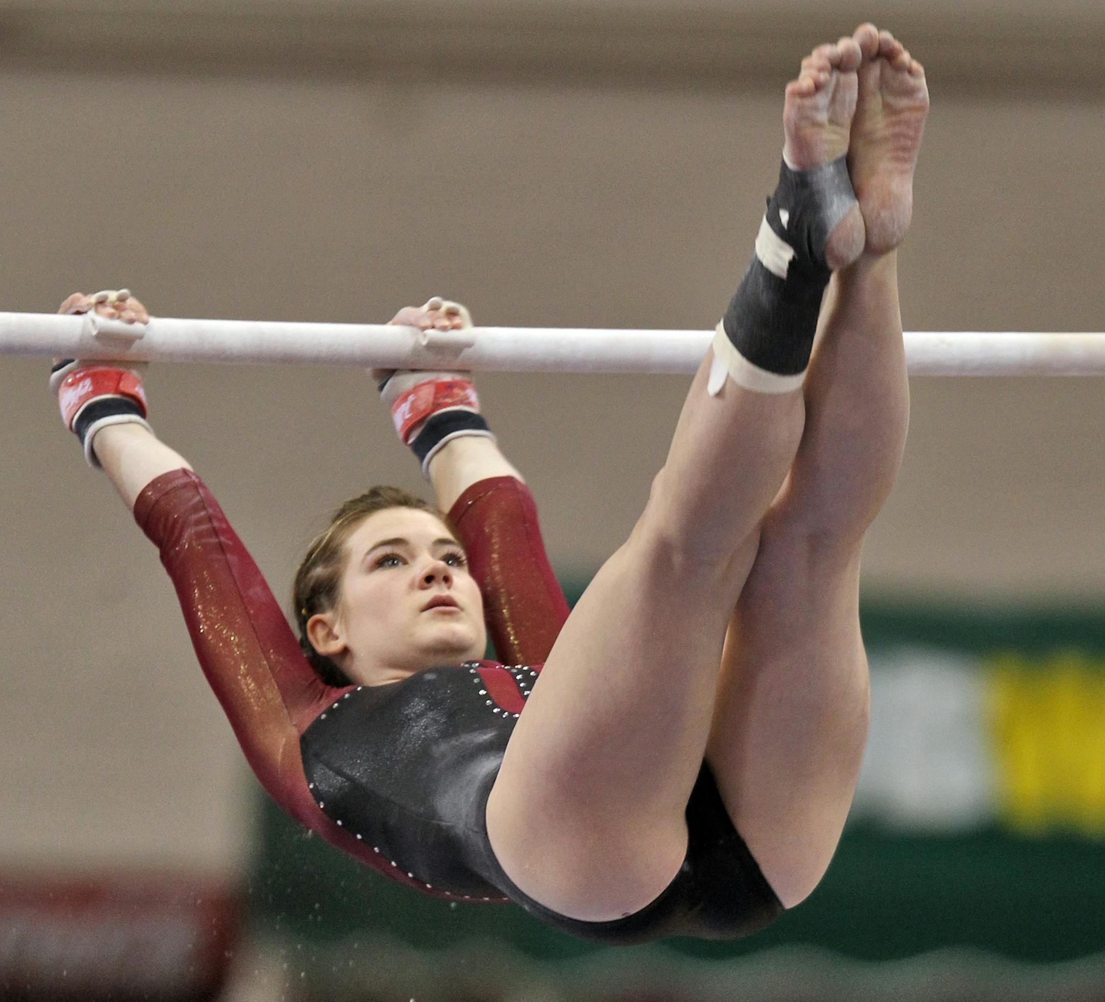 Northfield's Bailey DuPay performed on the uneven bars.