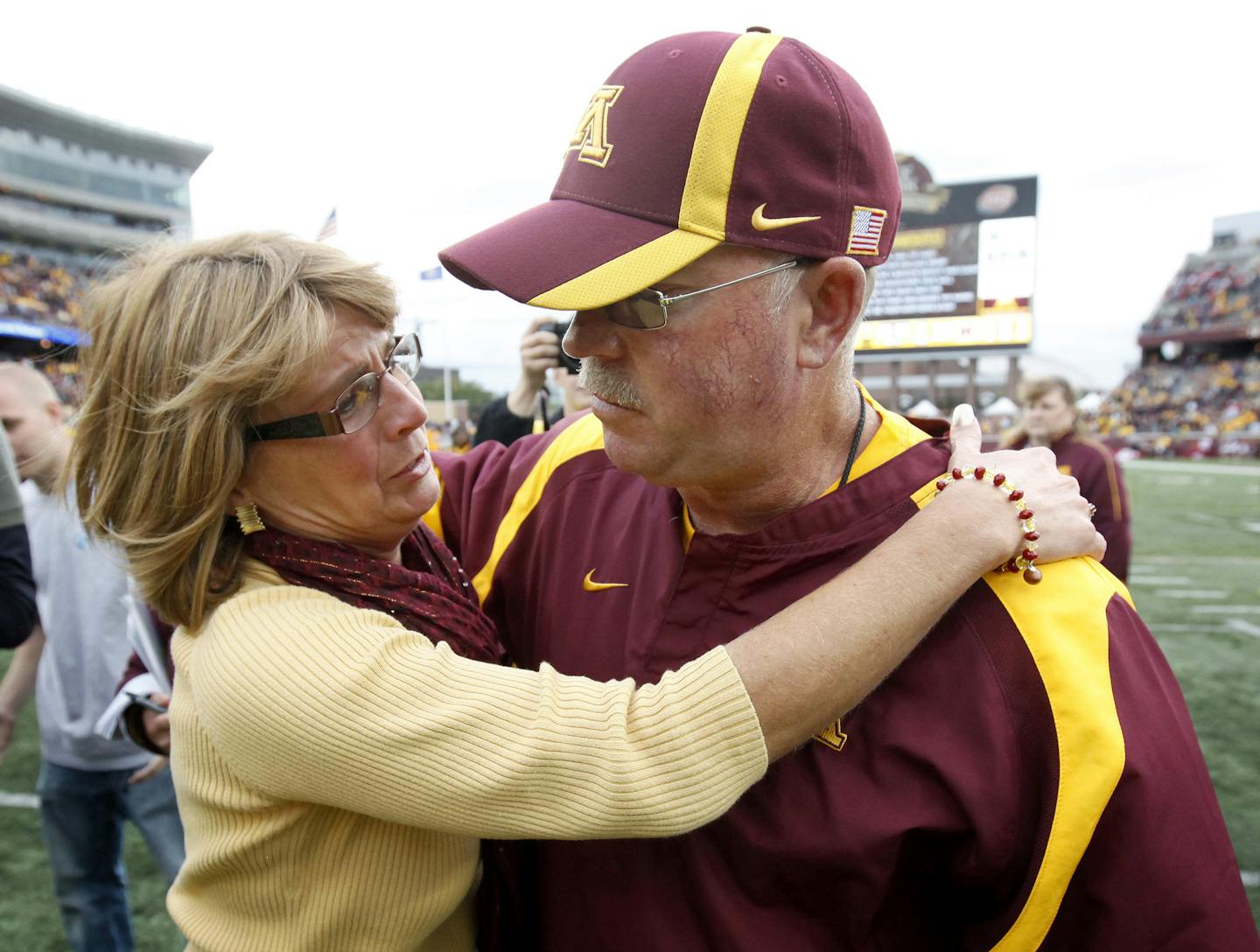 Minnesota head football coach Jerry Kill got a hug and kiss from his wife Rebecca at the end of the game. Minnesota beat Miami by a final score of 29 &#xf1; 23. The win was Kill's first as coach of the Gophers. ] CARLOS GONZALEZ cgonzalez@startribune.com , September 17, 2011, Minneapolis, Minn, NCAA Big Ten College Football, University of Minnesota Gophers vs. Miami of Ohio ORG XMIT: MIN2013080620080431