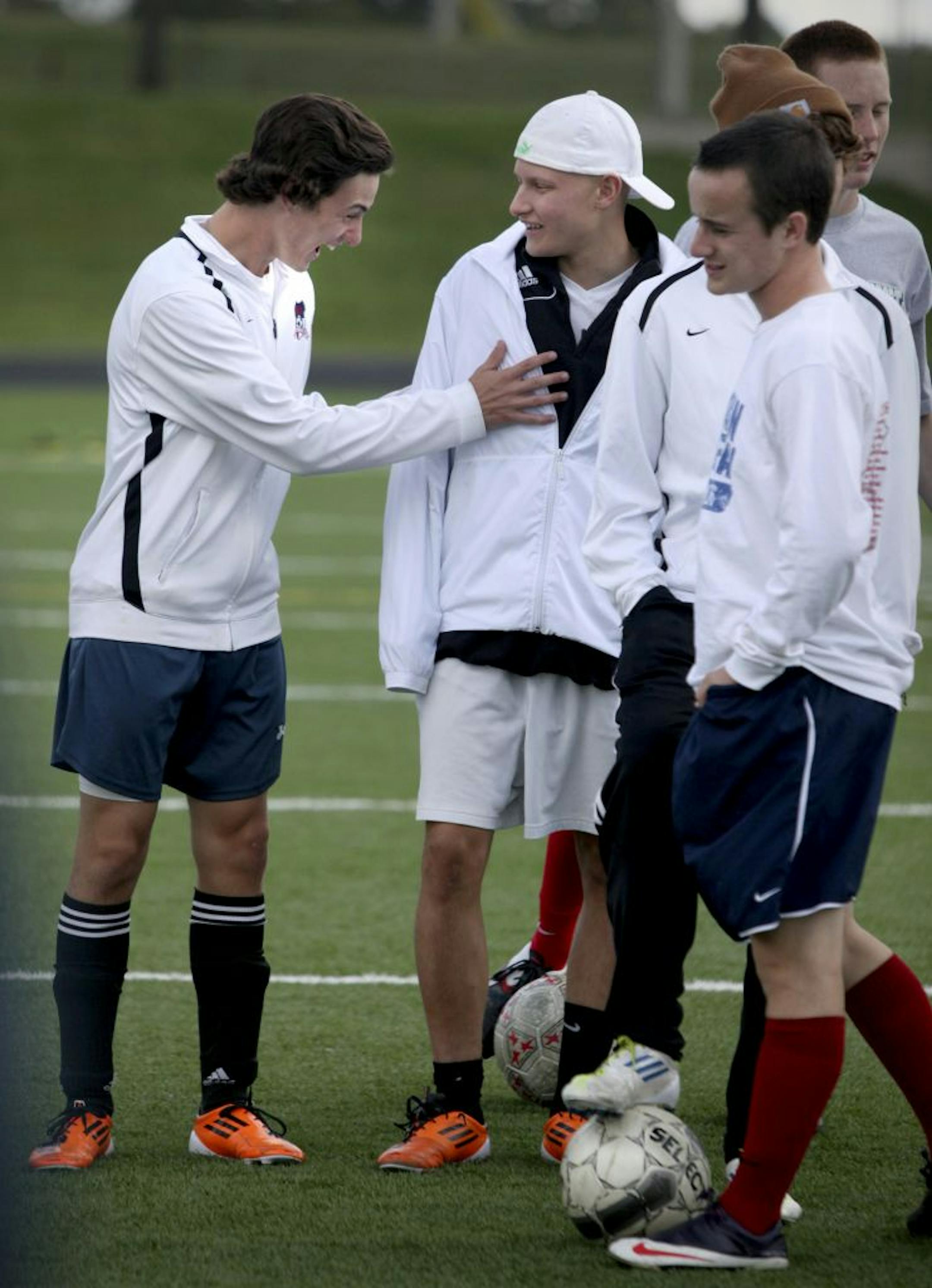 Nick Manzoni hangs with teammates.