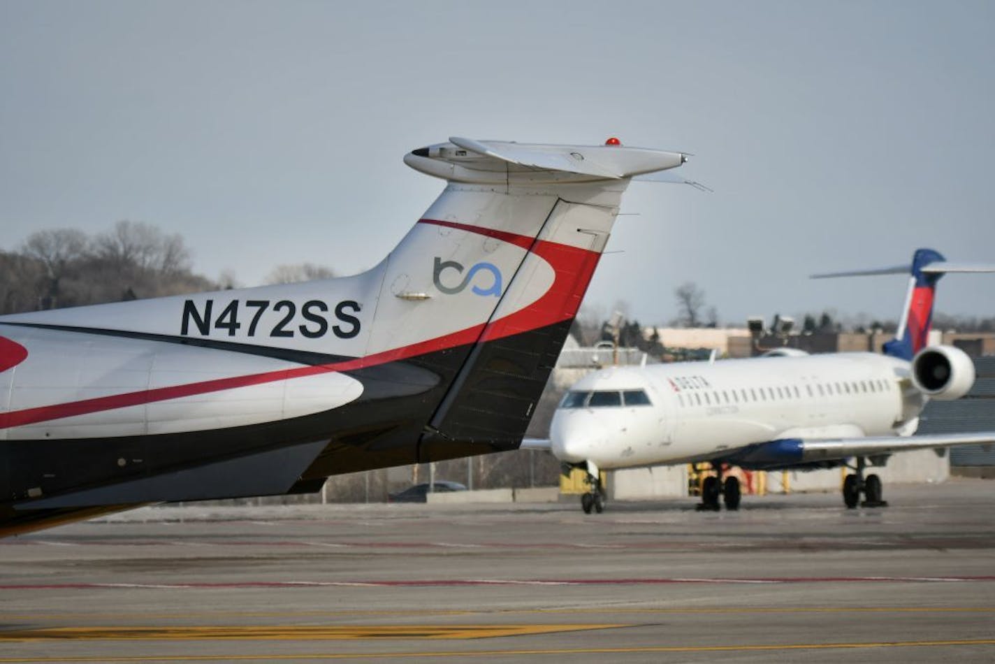 The Boutique Air 3:30 p.m flight to Thief River Falls taxied past Delta aircraft to the runway at MSP.