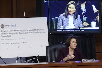 Sen. Amy Klobuchar, D-Minn., questions Supreme Court nominee Amy Coney Barrett during the third day of her confirmation hearings before the Senate Jud