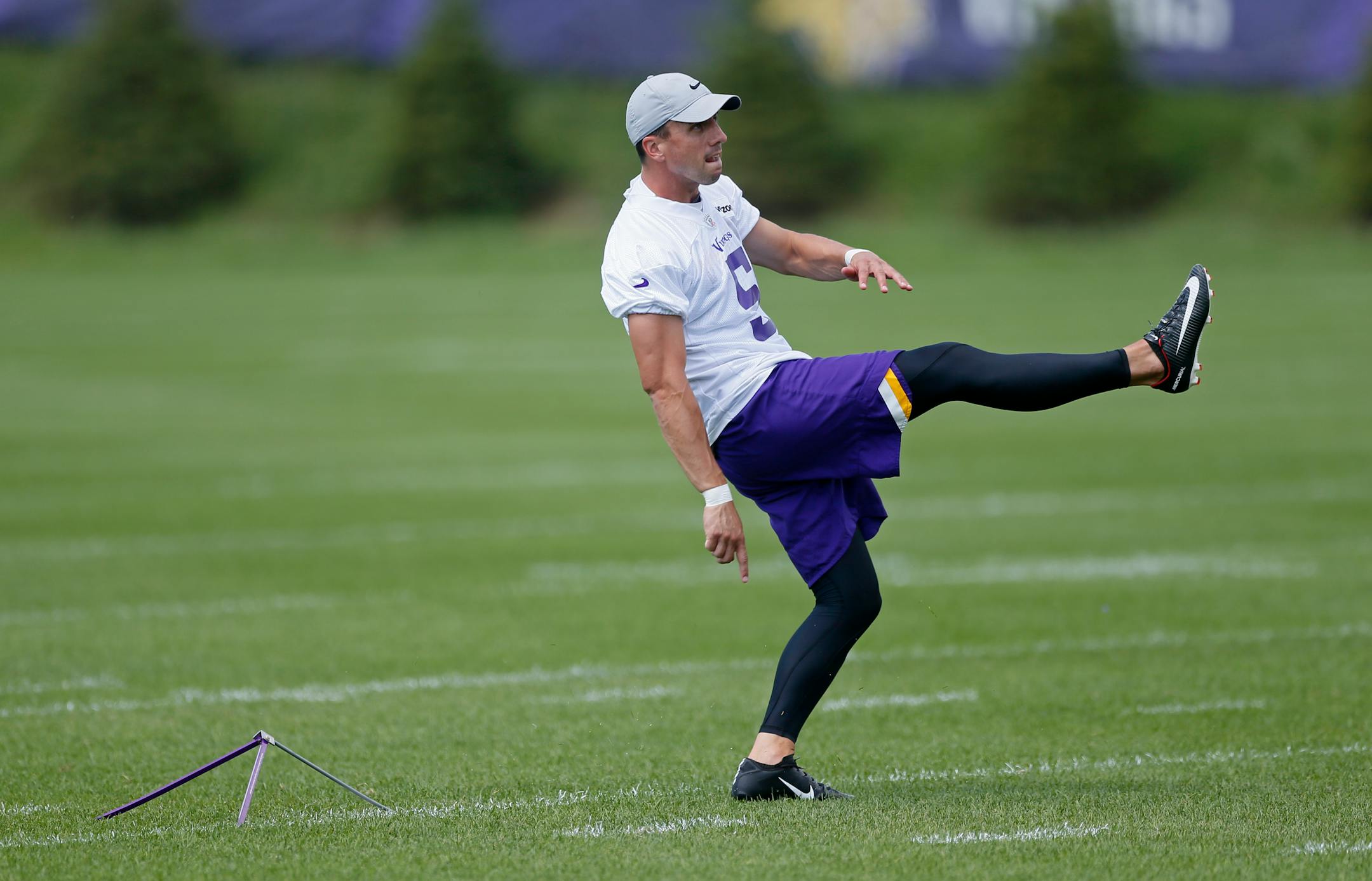 Minnesota Vikings kicker Dan Bailey kicks during the NFL football team's training camp practice Tuesday, Aug. 13, 2019, in Eagan, Minn. (AP Photo/Jim Mone)
