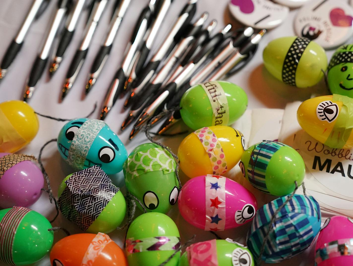 Cat toys made from plastic easter eggs, pasta shells, and tape made by volunteers sat ready for the cats at Feline Rescue. ] ANTHONY SOUFFLE &#xef; anthony.souffle@startribune.com The nonprofit Doing Good Together sponsored the first-ever Festival of Giving, where parents and children volunteered shoulder to shoulder and learned about other ways to give back Sunday, Sept. 30, 2018 at the Nicollet Island Pavilion in Minneapolis.