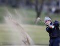 Ben Frazzini of Wayzata shoots out of a sand trap while playing in the Tri-State invitational at Edinburgh USA Golf course April 24, 2015 in Brooklyn 