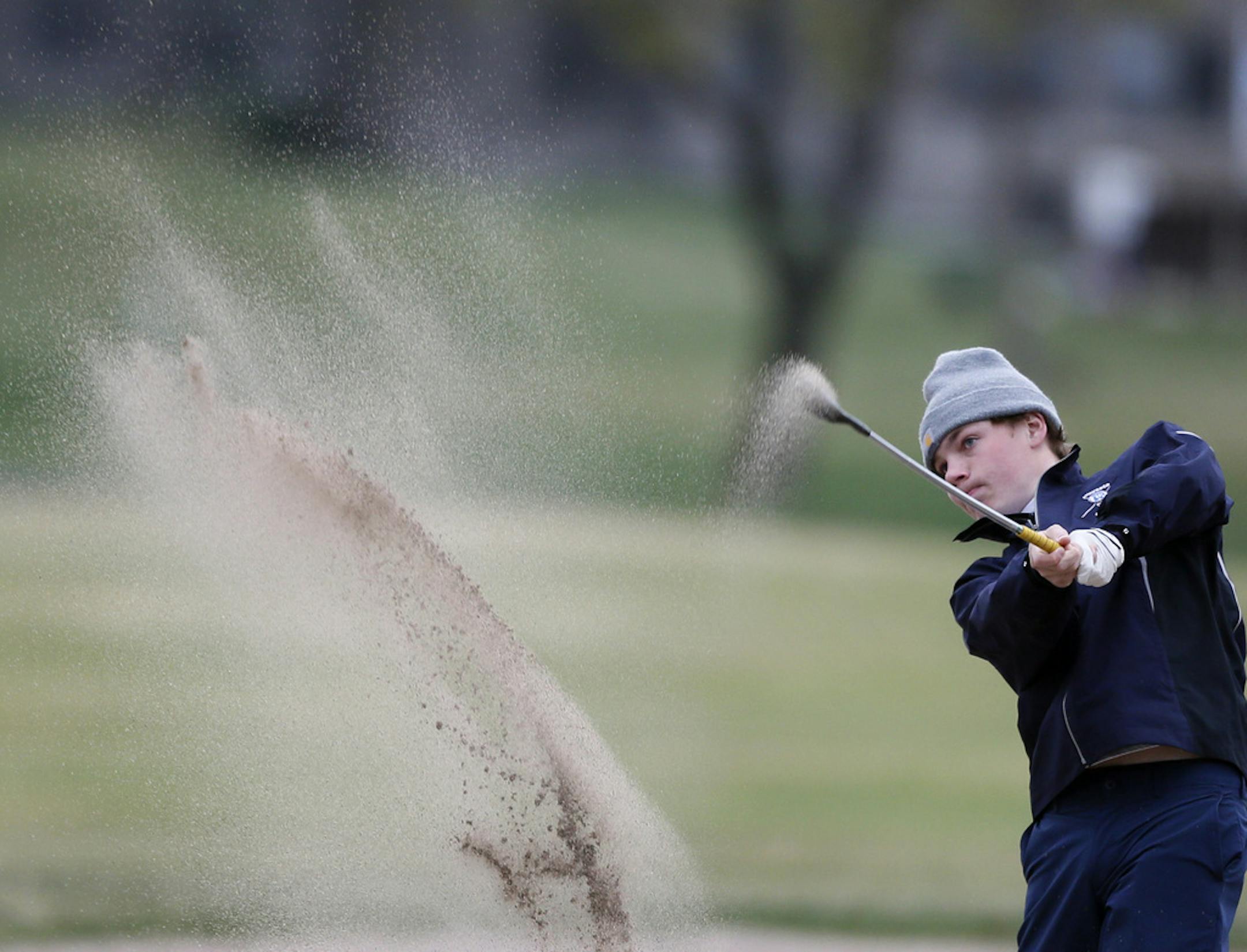 Ben Frazzini of Wayzata shoots out of a sand trap while playing in the Tri-State invitational at Edinburgh USA Golf course April 24, 2015 in Brooklyn Park, Minnesota.] Jerry Holt/ Jerry.Holt@Startribune.com