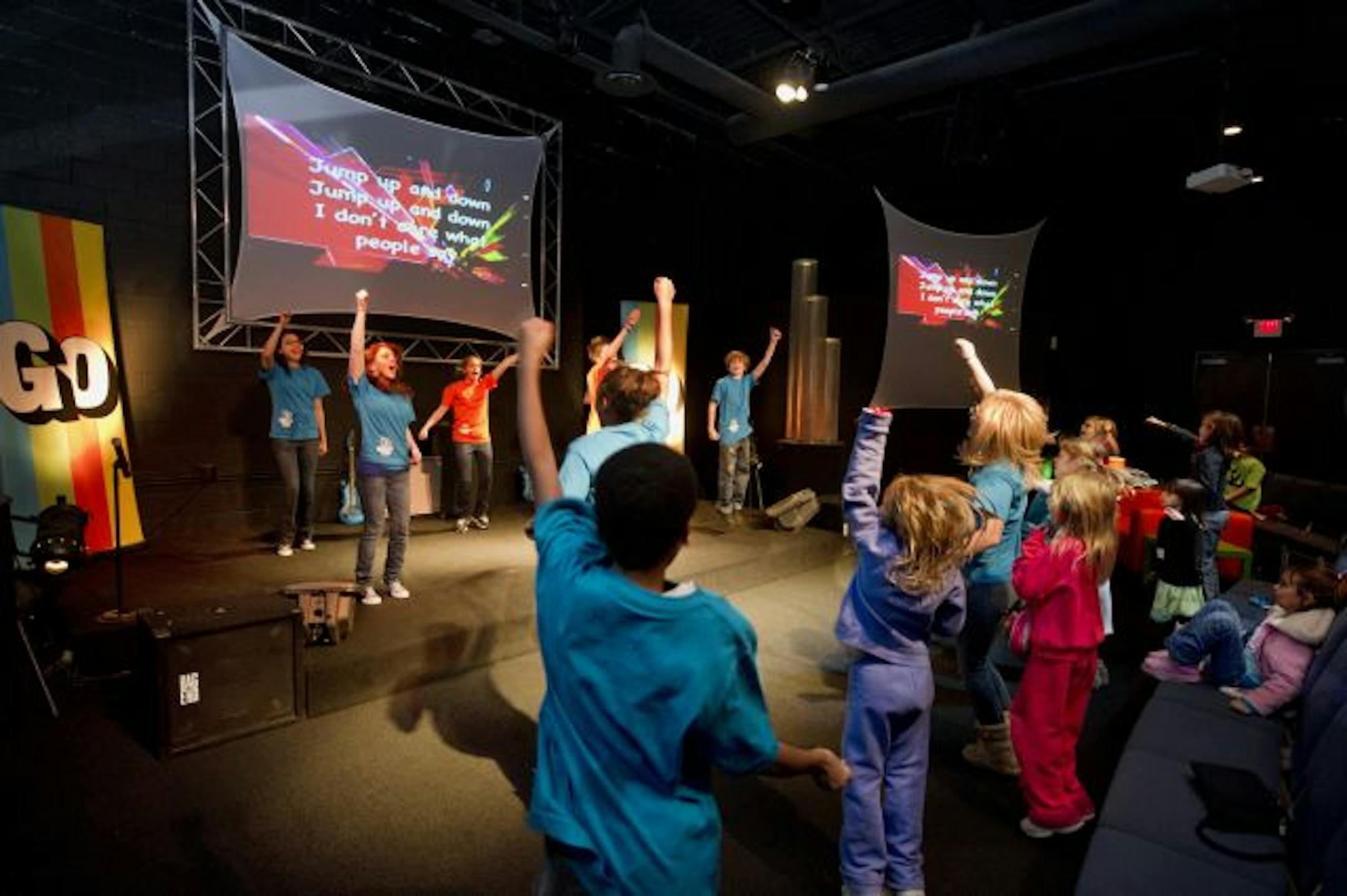 A group of K thru 5th graders participate in a service geared for kids while their parents went to a regular church service nearby, at the River Valley Church in Apple Valley. The kids service was lead by Pastor Tim McCann.