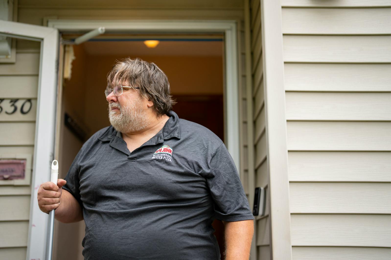 David Carlson, Vance Boelter’s best friend since fourth grade, tears up as he talks about Boelter outside their shared residence on Fremont Ave. N. in Minneapolis. Boelter stayed in one of the rooms in the house once or twice a week so he could live closer to work he did in the Twin Cities.