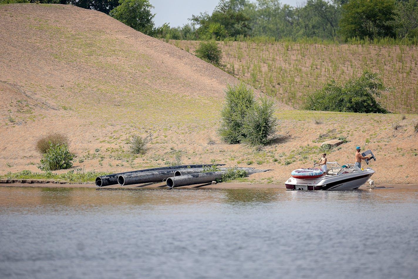 People fish one an island along the Mississippi near Wabasha, Minn., on Monday, July 24, 2023. ] Elizabeth Flores • liz.flores@startribune.com