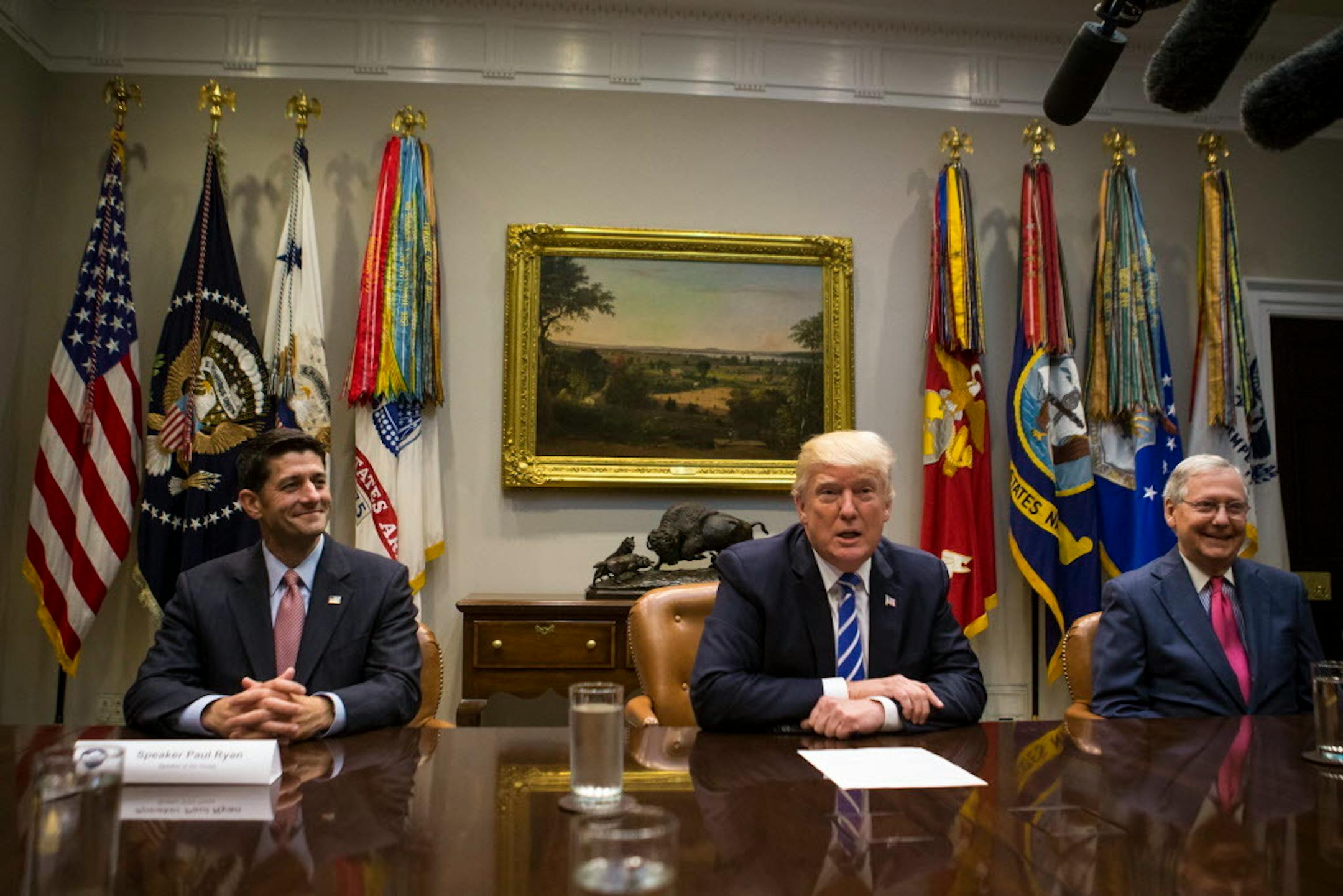 President Donald Trump meets with congressional leaders, including House Speaker Paul Ryan (R-Wis.), left, and Senate Majority Leader Mitch McConnell (R-Ky.) in the Roosevelt Room of the White House, in Washington, Sept. 5, 2017. Trump is ending the Deferred Action for Childhood Arrivals program shielding young undocumented immigrants from deportation, and urged Congress to take action before it fully expires in March 2018. (Al Drago/The New York Times)