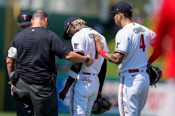 Nick Gordon of the Twins left the field Friday after spraining his left ankle against the Red Sox in Fort Myers, Fla.