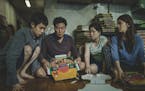 This image released by Neon shows Woo-sik Choi, from left, Kang-ho Song, Hye-jin Jang and So-dam Park in a scene from "Parasite." (Neon via AP)