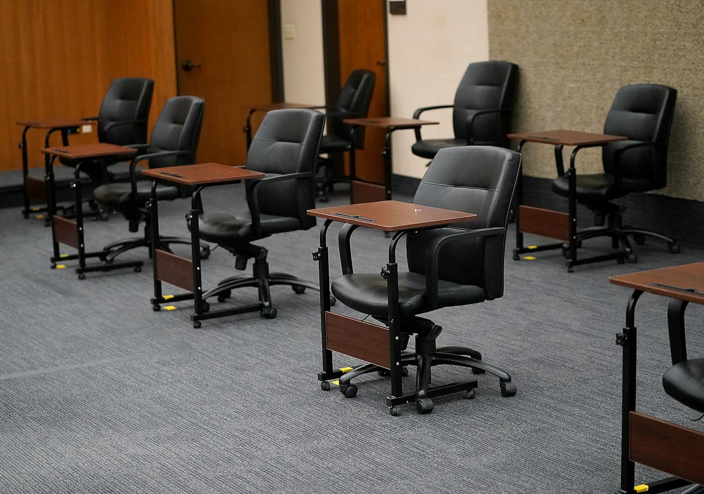 The courtroom C-1856, including these juror seats, where the Derek Chauvin trial will take place at the Hennepin County Government Center and seen Friday in Minneapolis. ]