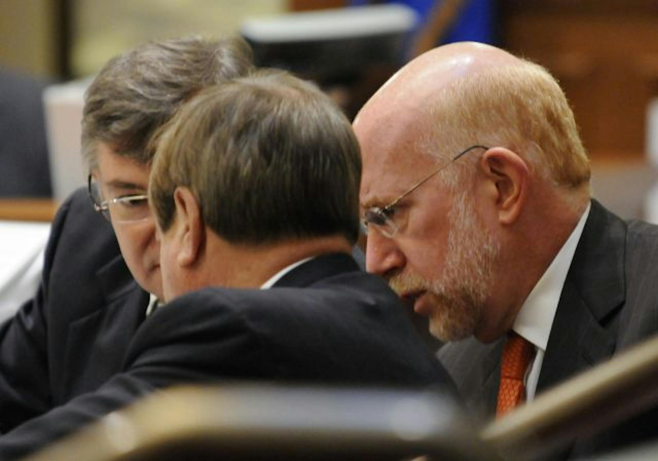 Attorneys for Norm Coleman conferred Tuesday during the recount trial in St. Paul. Tony Trimble is at left, Ben Ginsberg is at right and Joe Friedberg has his back to the camera.