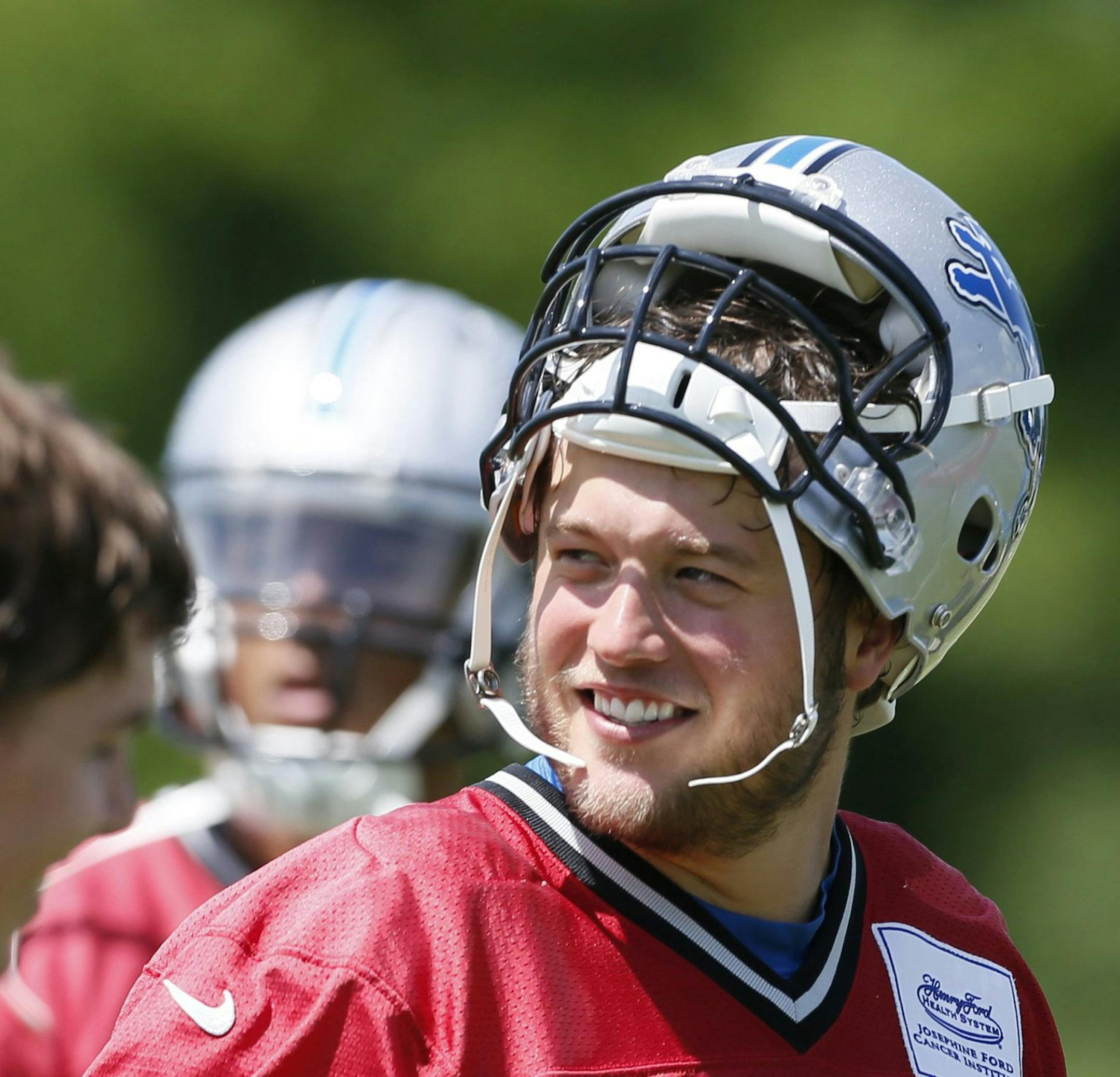 Detroit Lions quarterback Matthew Stafford walks off the field after the team's OTA practice in Allen Park, Mich., on June 3, 2014. (Julian H. Gonzalez/Detroit Free Press/MCT) ORG XMIT: 1153665