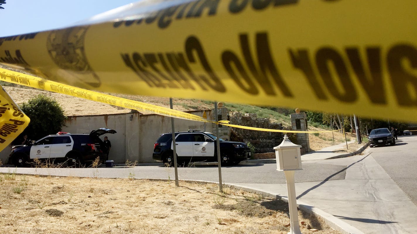 LAPD has blocked off the entrance to Chris Brown's home Tuesday morning, Aug. 30, 2016 in Tarzana, Calif. Police are seeking a search warrant for the singer's home to look for a weapon he allegedly used to threaten a woman early Tuesday morning. (Katie Falkenberg/Los Angeles Times/TNS) ORG XMIT: 1189396