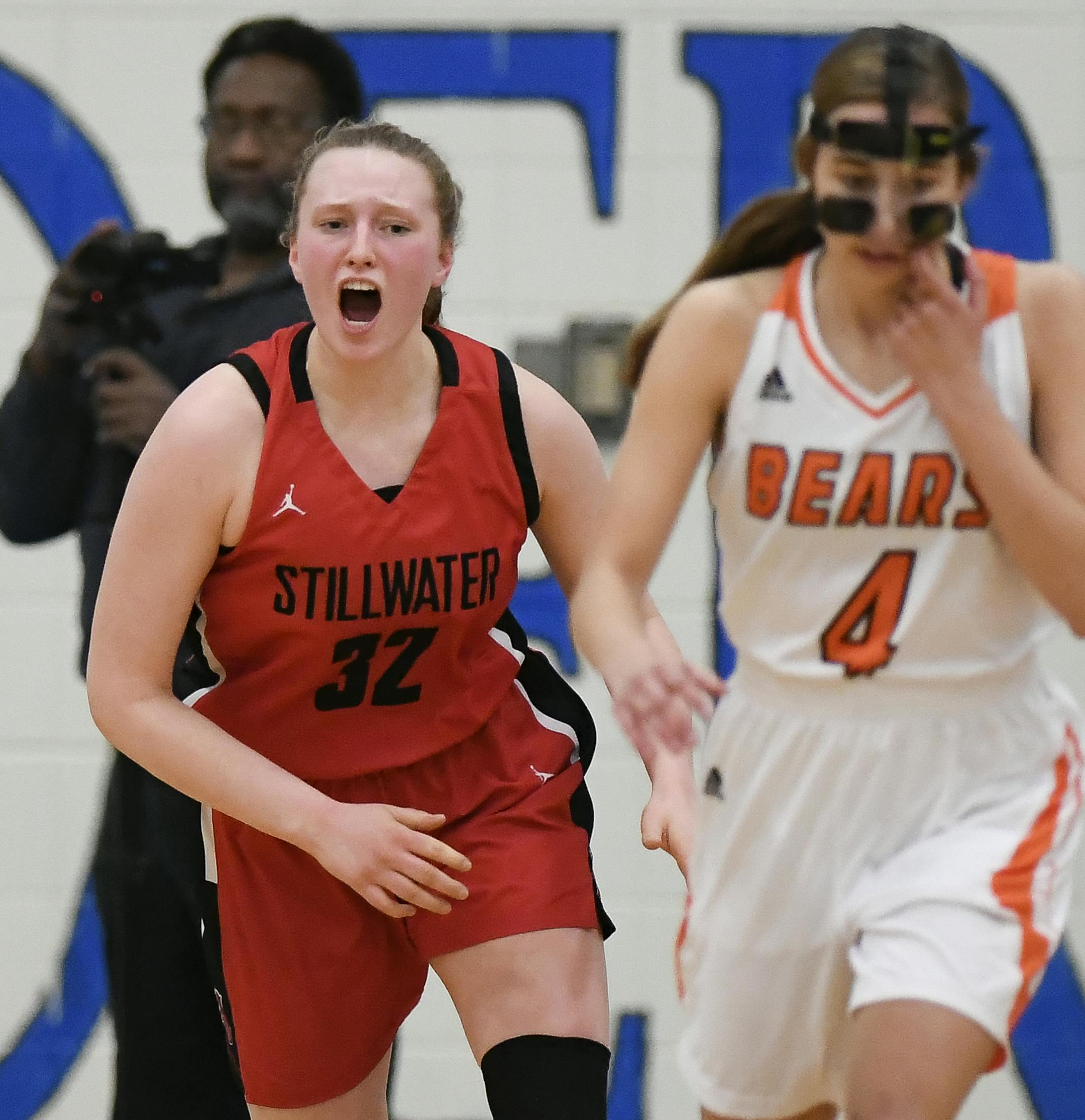 Stillwater forward Liza Karlen (32) celebrated a basket in the first half against White Bear Lake. ] Aaron Lavinsky ¥ aaron.lavinsky@startribune.com Stillwater played White Bear Lake in the Class 4A, Section 4 final on Thursday, March 7, 2019 at Hastings High School in Hastings, Minn.