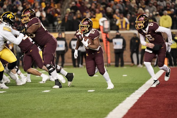 Gophers running back Mohamed Ibrahim (24) helped the team move away from its own end zone in the fourth quarter of Saturday’s game at Huntington Ban