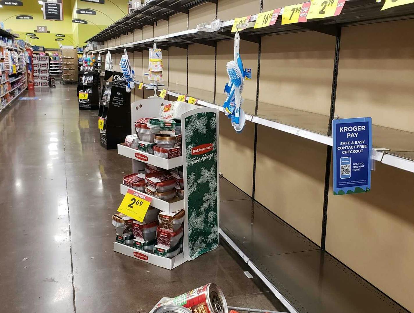 Shelves at a grocery store sat empty in Happy Valley, Ore., on Nov. 14, the day after the governor announced new restrictions.