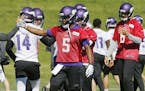 Minnesota Vikings quarterback Teddy Bridgewater (5) joins other quarterbacks including Sam Bradford, right, during the NFL football teams practice Tue