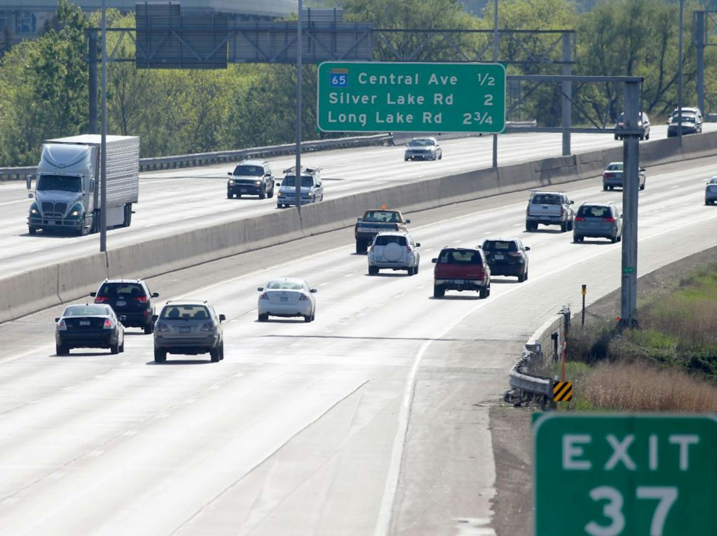 Traffic again flows Saturday along I-694 in both directions near University Ave. in Fridley, where a man was fatally shot Friday night after he pulled away from a traffic stop in the westbound lane and dragged a Lino Lakes police officer.