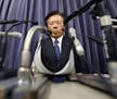 Mitsubishi Motors Corp. President Tetsuro Aikawa listens to a reporter's question during a press conference in Tokyo, Tuesday, April 26, 2016. Mitsubi