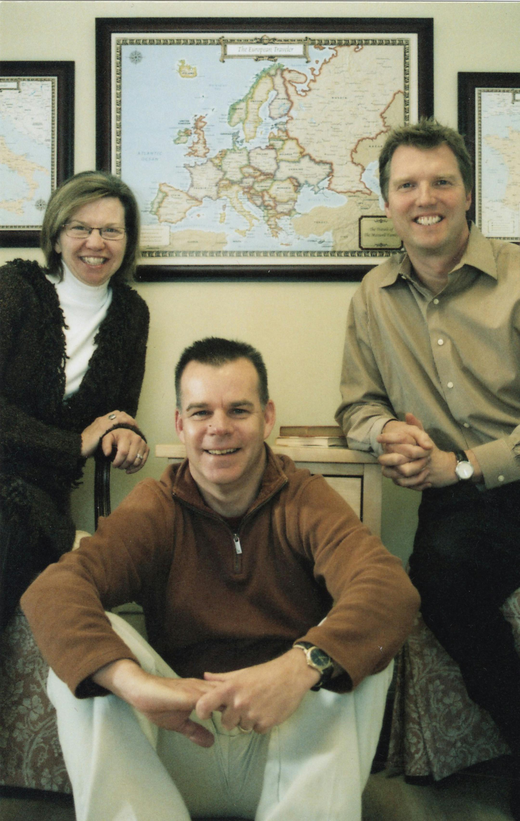 Mark Jensen, right, founded Jessen Media to generate business for his printing company. David Hellstrom and Nancy Spangrud made it work with a line of personalized maps and other printed gift items.