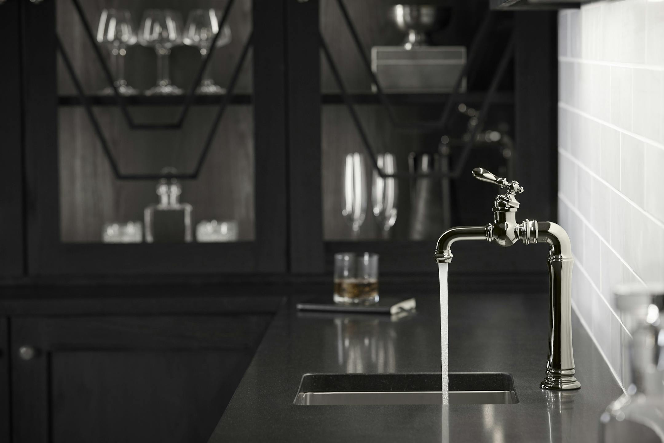 The ideal bar faucet is compact with a shorter reaching spout that helps contain the water in the smaller sink area. (Handout/TNS) ORG XMIT: 1192038
