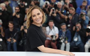 Actress Judith Godreche poses for photographers at the photo call for the film 'The Climb' at the 72nd international film festival, Cannes, southern F