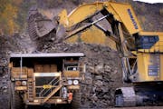 In 2006, a hydraulic shovel scraped up 50 tons at a time of taconite ore chunks and dumped it into a 240-ton dump truck at United Taconite in Eveleth,