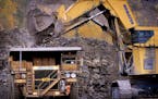 In 2006, a hydraulic shovel scraped up 50 tons at a time of taconite ore chunks and dumped it into a 240-ton dump truck at United Taconite in Eveleth,