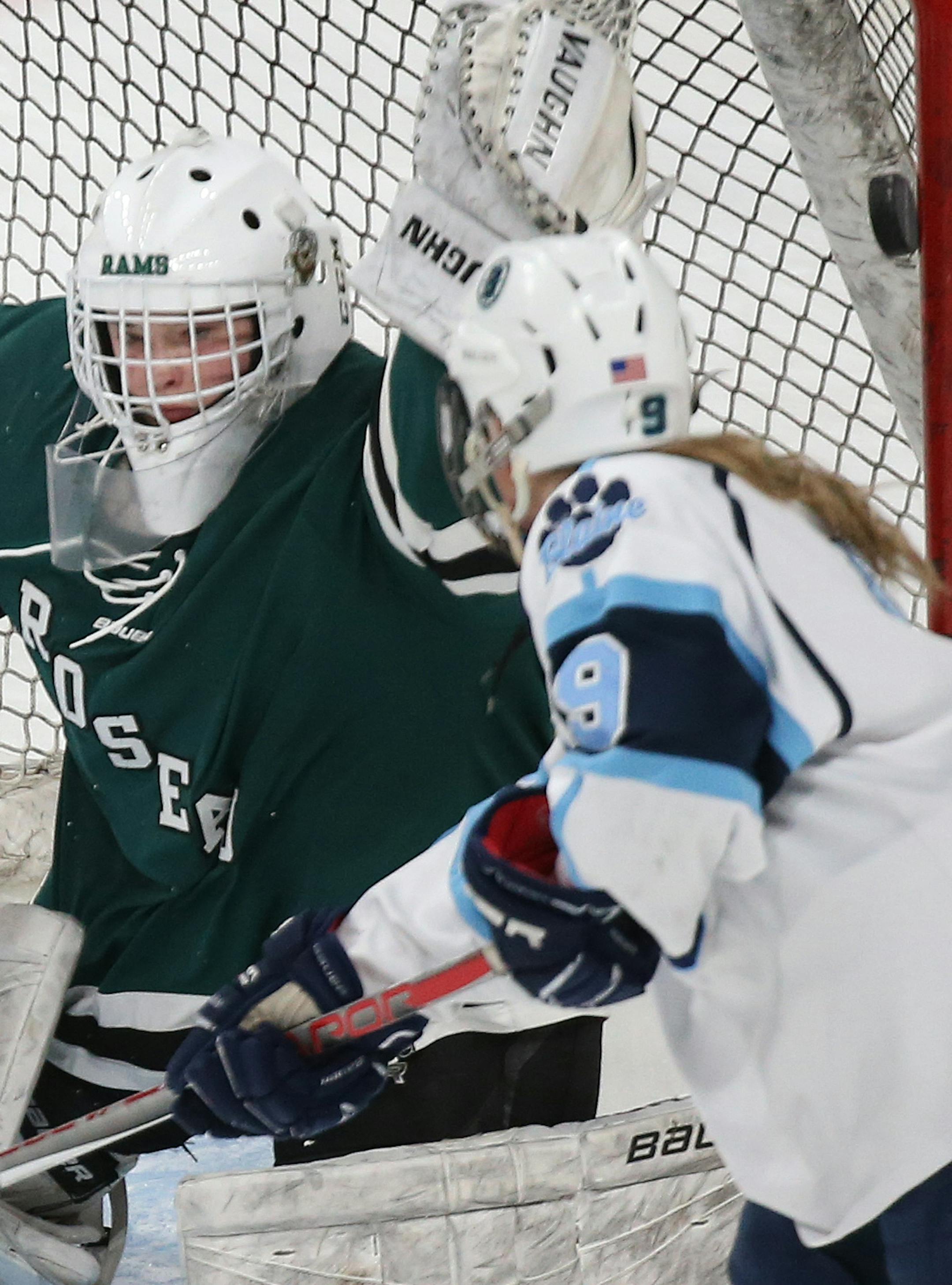 Blaine's Maggie Crosson (9) watched as the puck slid into the net passed Roseau's goalie Kiana Flaig's glove for a goal during the second period. ] (KYNDELL HARKNESS/STAR TRIBUNE) kyndell.harkness@startribune.com Girls' hockey state tournament. Roseau vs. Blaine Thursday, Feb. 23, 2016 at the Xcel Energy Center in St. Paul, Min. Blaine won 7-1 over Roseau