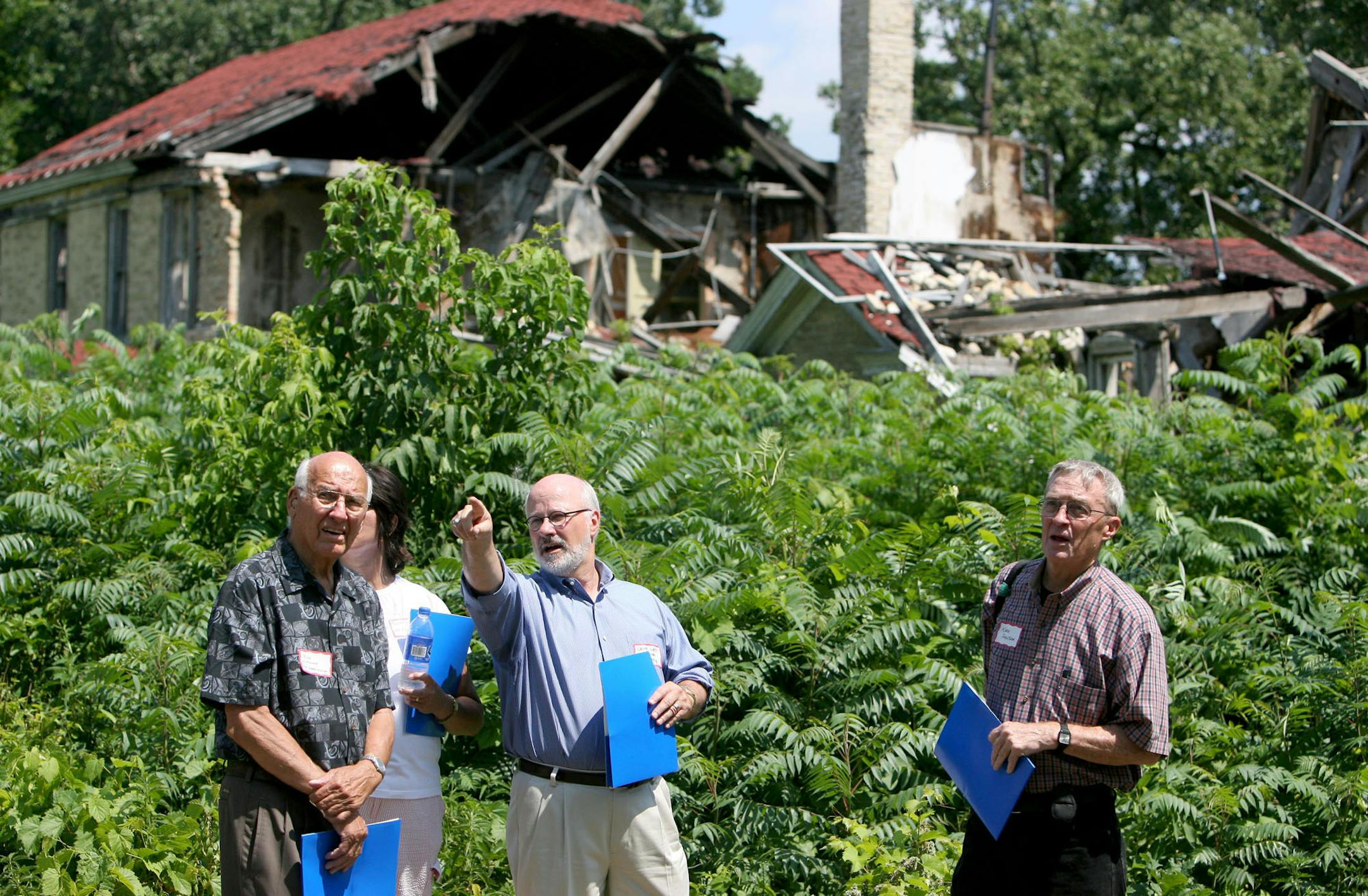 ELIZABETH FLORES ï eflores@startribune.com ] July 28, 2008 - Minneapolis, MN - Chuck Liddy Miller gave a tour and explained the future of the Fort Snelling Upper Post after a press conference. The building behind Liddy Miller, building #63 which was originally a quarter master's building, recently collapsed. Federal, state and county officials joined national and local preservation groups to discuss the future of the historic site and possible next steps to restoring or redevloping the 141-