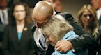Patty Wetterling is consoled by son Trevor during a press conference after Danny Heinrich admitted killing her son Jacob on Sept. 6, 2016 in Minneapol