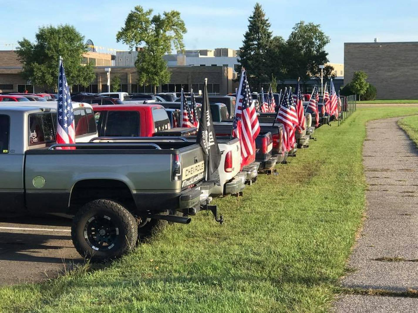 ROCORI High School students protest a ban on flying flags from their vehicles while parked on school grounds. ORG XMIT: ur1PbVcbUVnqCbxUvEwu