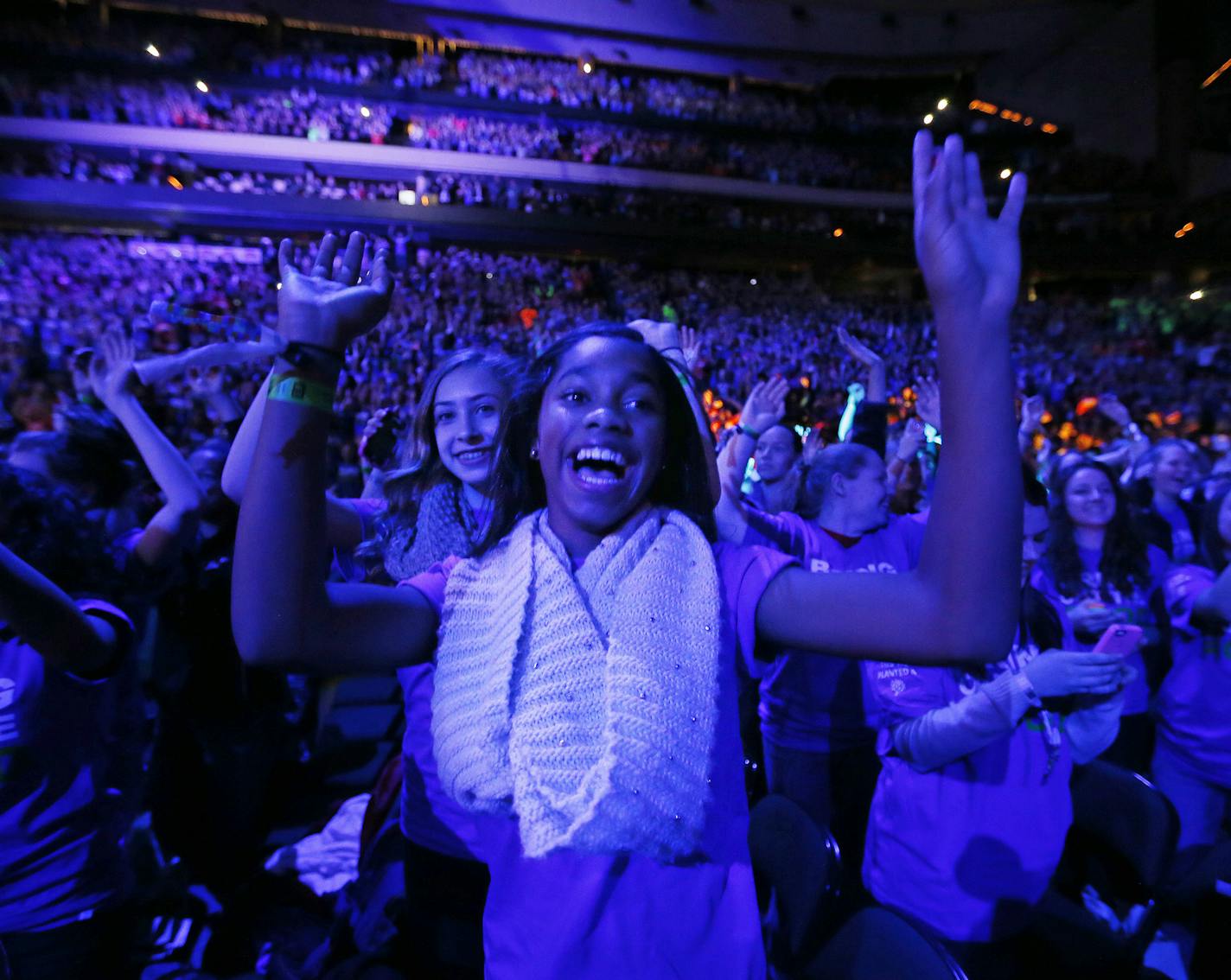 Callie Bigbee left Jaylin Baah both freshmen at Farmington High school danced at We Day in Minnesota Wednesday November 12, 2014 in St. Paul ,MN. About 18,000 Minnesota high school students will descend upon the Xcel Energy Center Wednesday for the second annual We Day extravaganza. The high-energy event celebrates volunteer efforts by Minnesota students, and attracts a lineup of inspirational speakers and celebrities ranging from Nelson Mandela's grandson to actor Martin Sheen. We'll check out