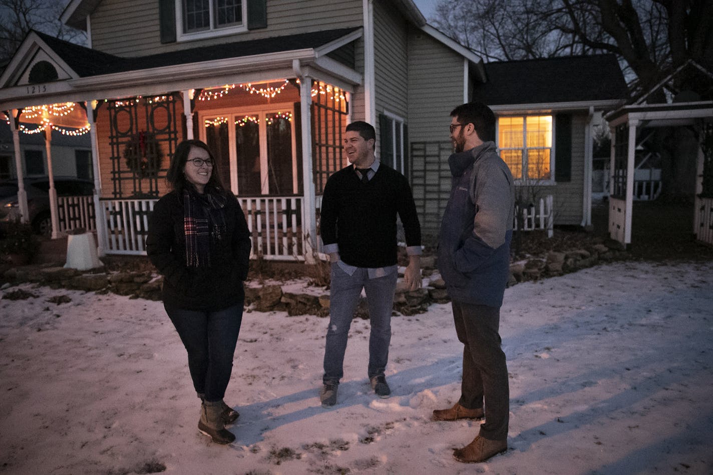 With the help of Keller Williams sales agent Nick George,center, Owen and Bailey Kinsky will soon close on their first home in Stillwater.