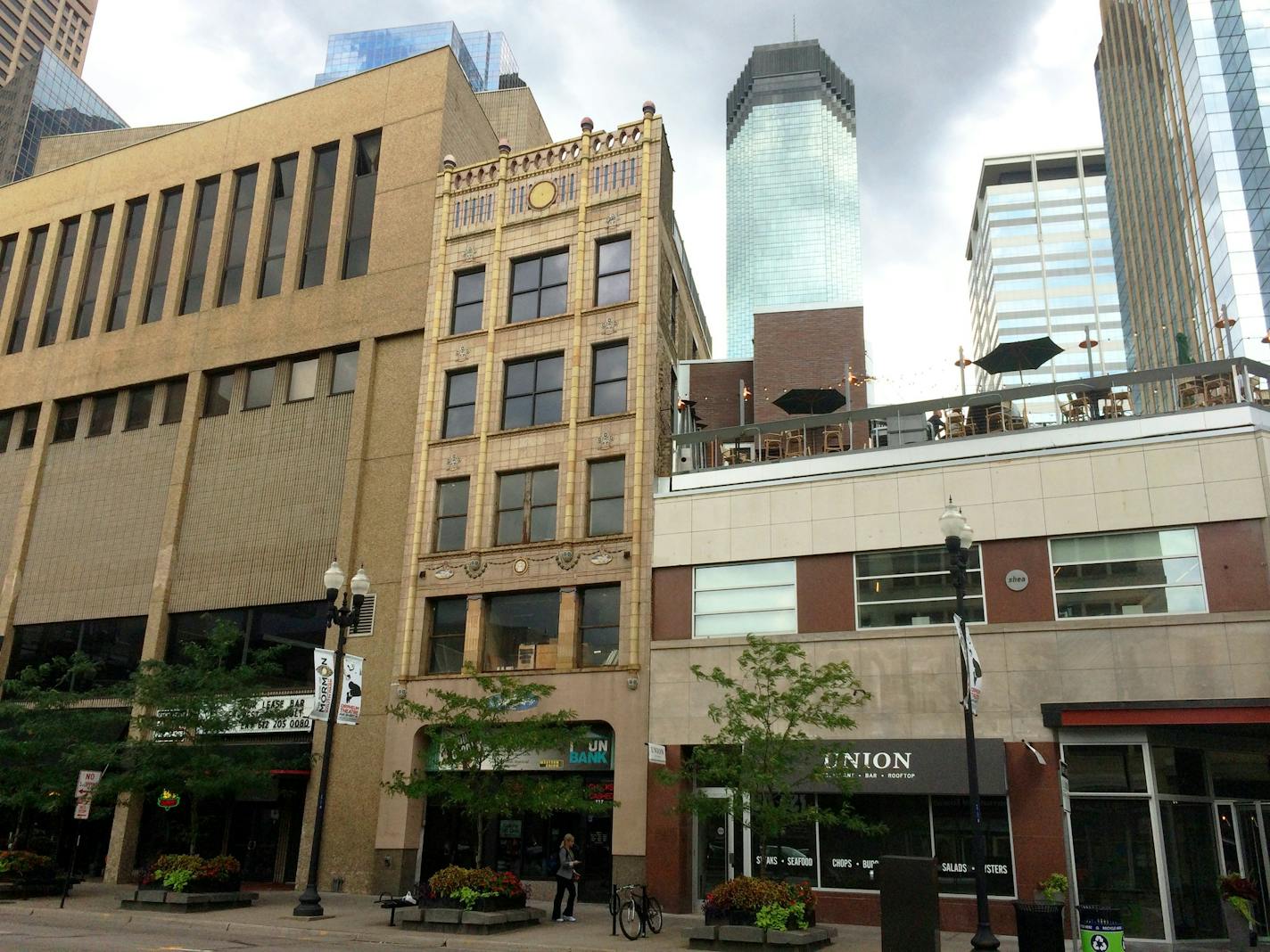 The Teener building, middle, was built in 1922. The Brave New Workshop signed a purchase agreement on the building to expand its downtown Minneapolis presence.