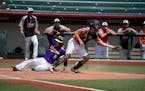 Alex Logelin of Waconia slides into home during the 2017 Class 3A State Tournament Championship against Marshall, at Siebert Field in Minneapolis on F