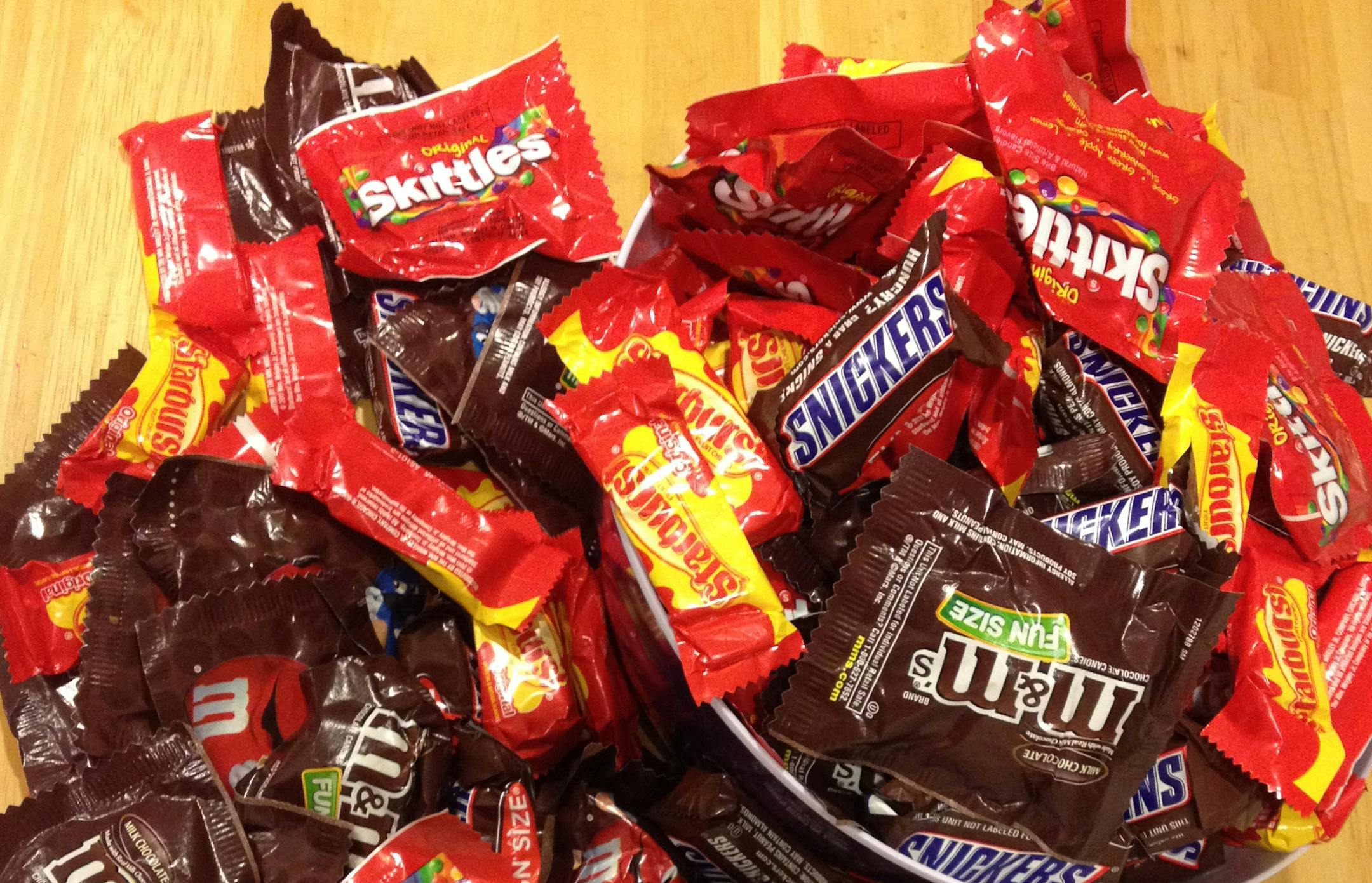 This image released by Jason Varden shows candy purchased in anticipation of Halloween trick-or-treaters iat his home in Milpitas, Calif. on Monday, Oct. 27, 2014. But like a lot of adults who buy sweets prior to the holiday, Varden acknowledges that he doesn’t usually get many trick-or-treaters and often ends up consuming the sweets. Still, he wants to be prepared just in case kids do drop by. (AP Photo/Jason Varden)