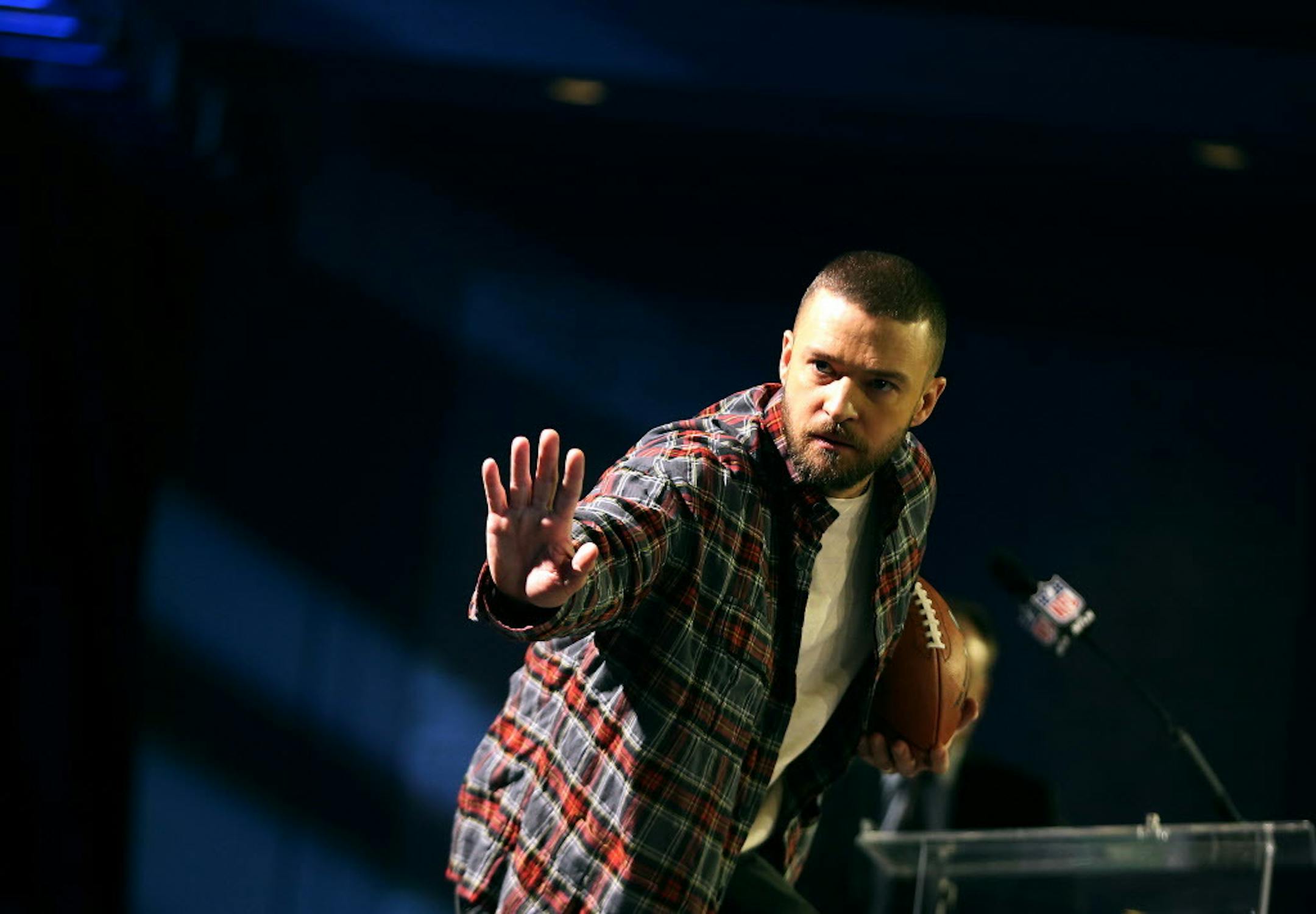 Justin Timberlake struck a Heisman pose after a press conference at the Hilton Hotel on Feb. 1.