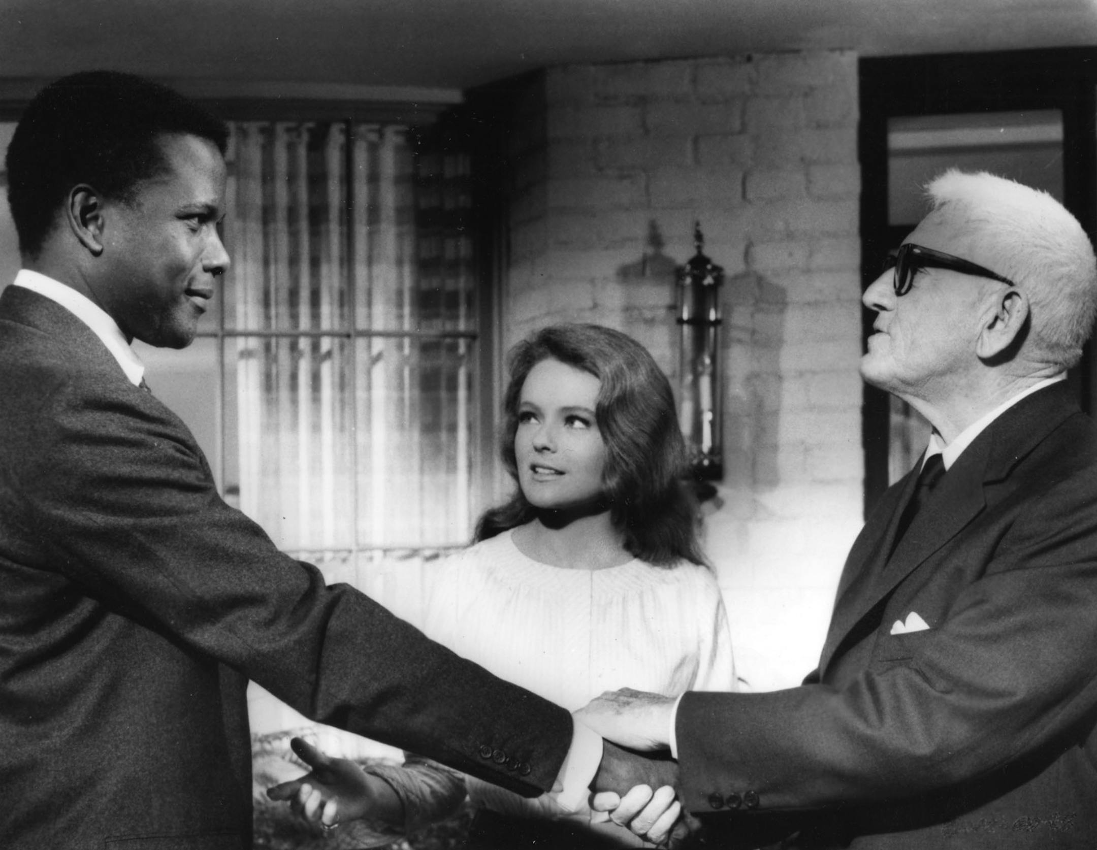 (left to right) Sidney Poitier, Katharine Houghton, and Spencer Tracy star in the 1967 movie "Guess Who's Coming to Dinner." Katharine Hepburn (not pictured here) also stars. File photo courtesy of Columbia Pictures.