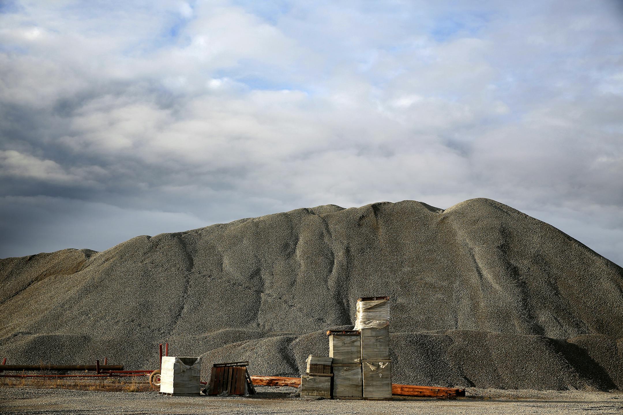 Aggregate mix for concrete is piled on the site of Essar Steel Minnesota's taconite mine project in Nashwauk, Minn., in 2014. New owners say construction could be back on in September. (LEILA NAVIDI/Star Tribune file photo)