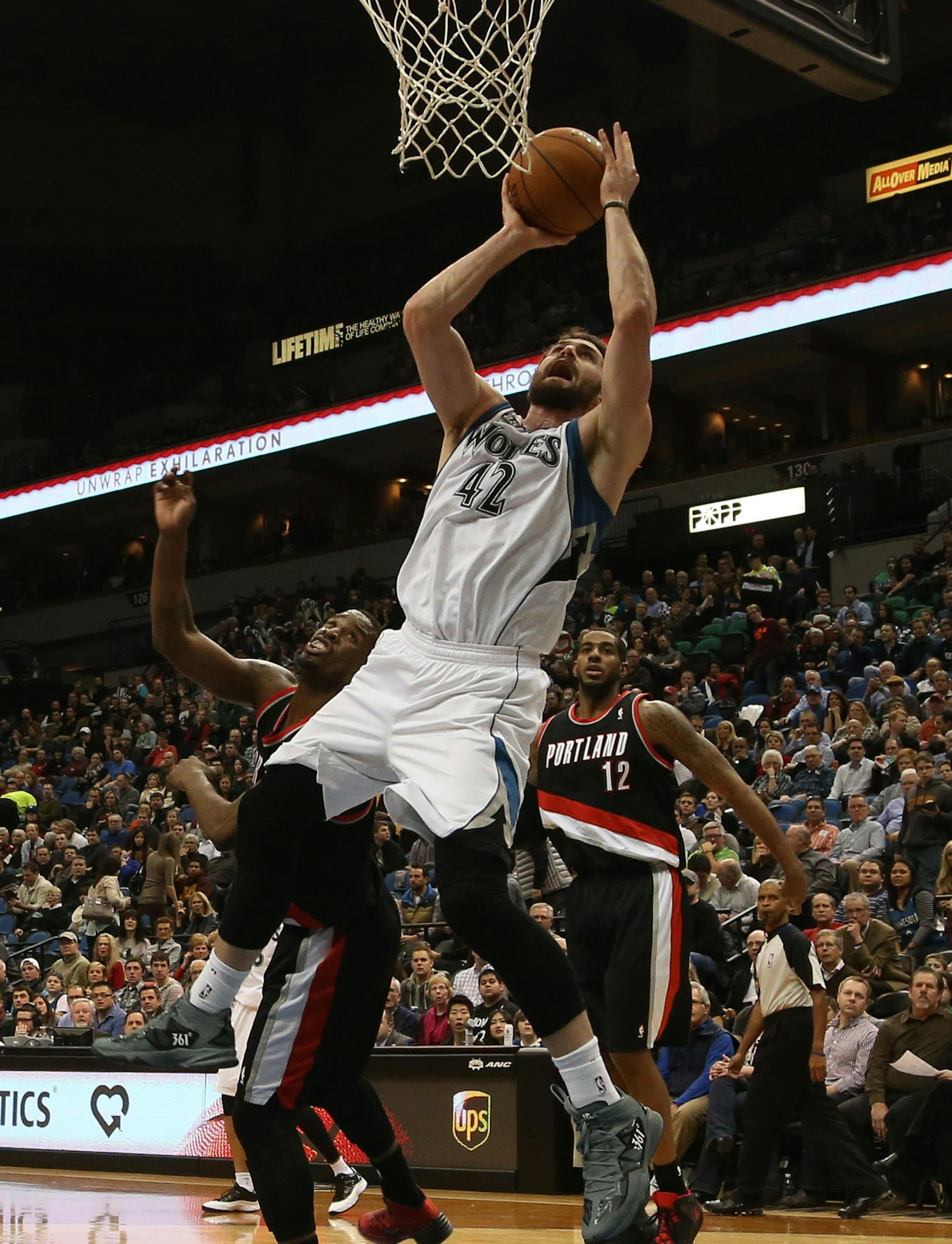 Wolves Kevin Love ran passed Portland defenders on his way to the basket during the first half at the Target Center in Minneapolis Wednesday, December 18, 2013. ] (KYNDELL HARKNESS/STAR TRIBUNE) kyndell.harkness@startribune.com