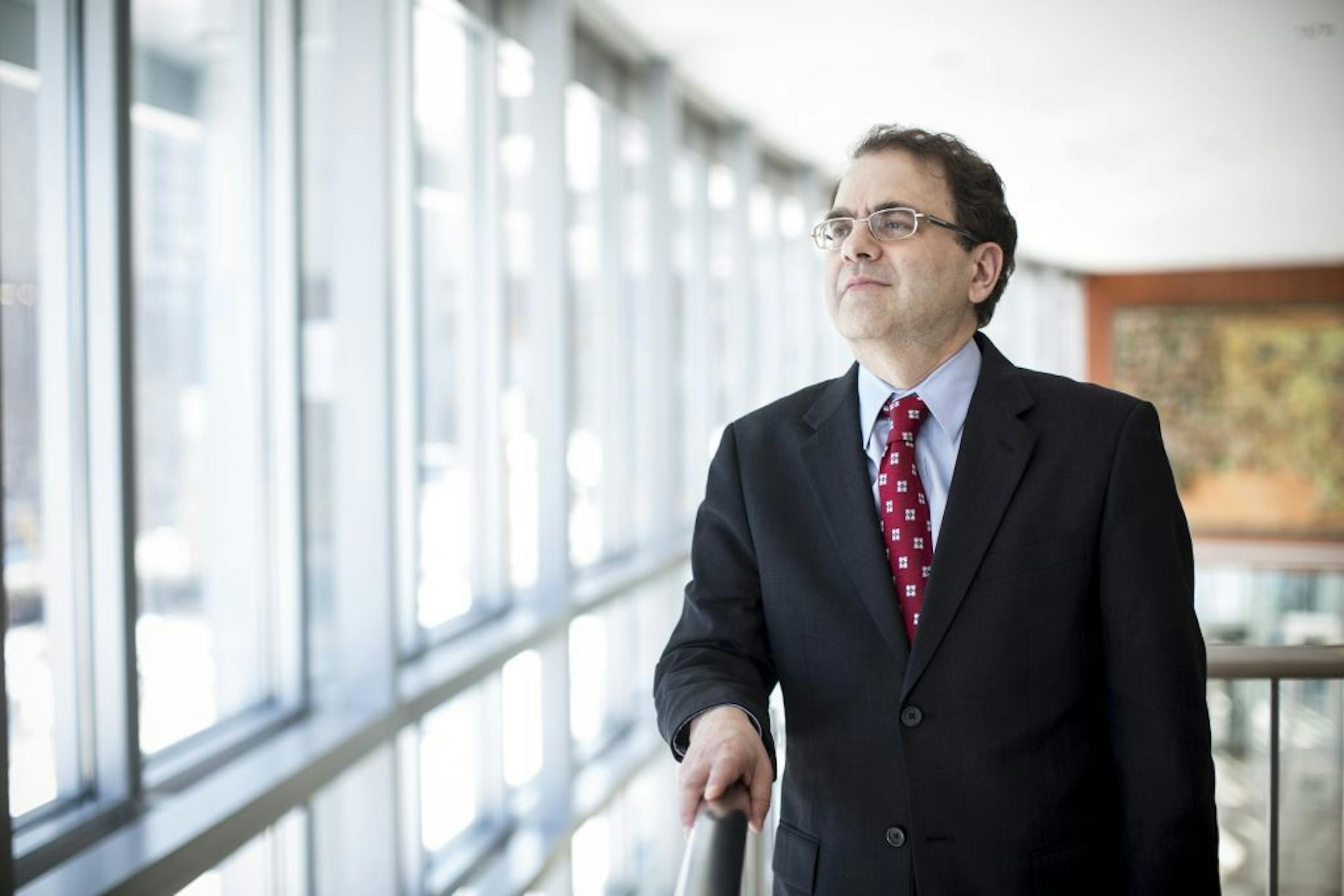 FILE -- Narayana Kocherlakota, president of The Federal Reserve Bank of Minneapolis, who cast the sole dissenting vote against the Federal Reserve's decision to halt its bond buying program, at the bank in Minneapolis, Jan. 17, 2014. The Fed announced Wednesday Oct. 29, 2014 that it would stop buying bonds to help buoy the U.S. economy, the third time since 2008 it has announced such a move, but many say that this time the decision is more likely to stick.