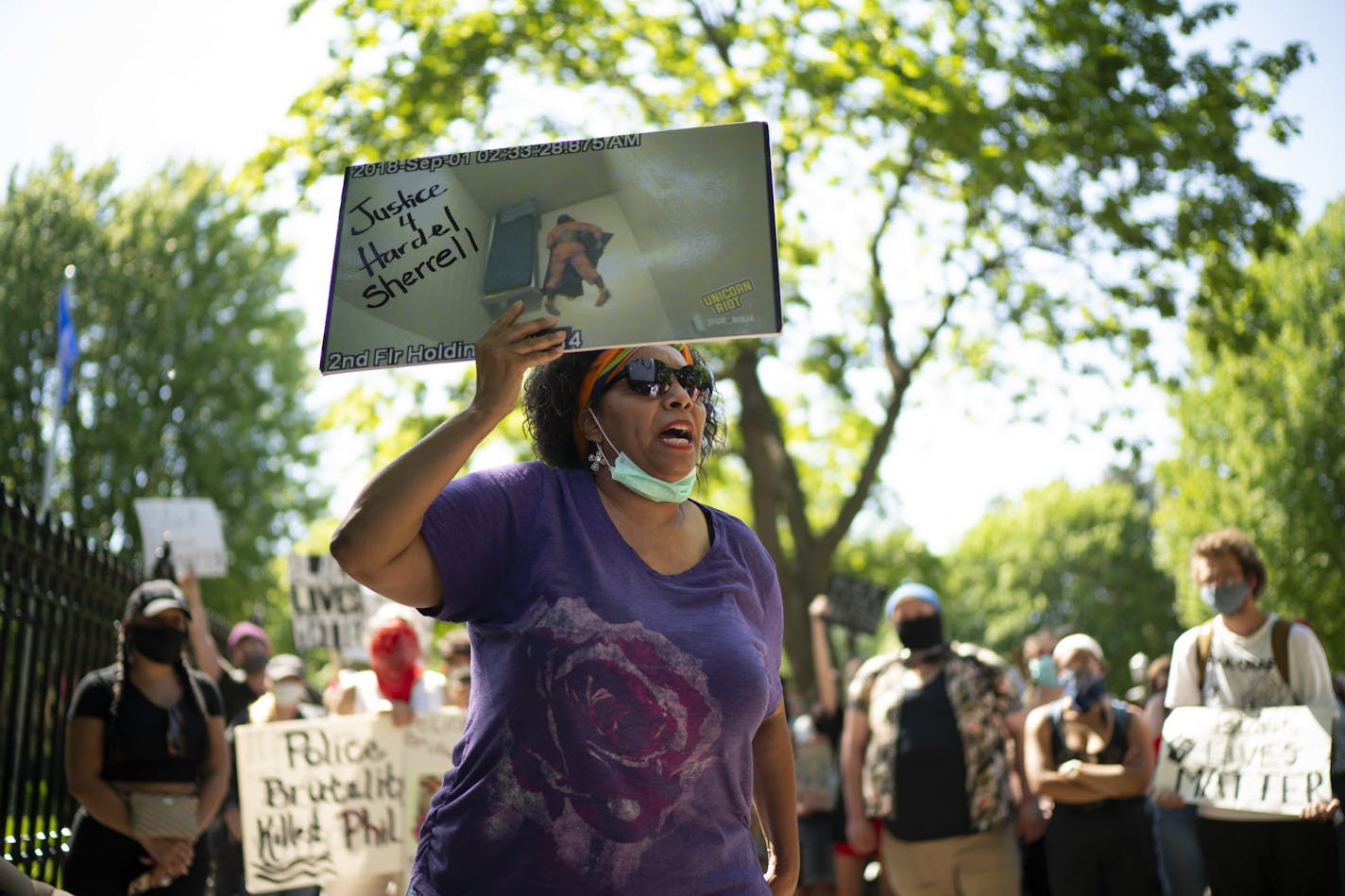 Del Shea Perry, the mother of an Apple Valley man who died in the Beltrami County jail in 2018, spoke to the early crowd at the demonstration in front of the governor's residence on Monday, June 1, in St. Paul.