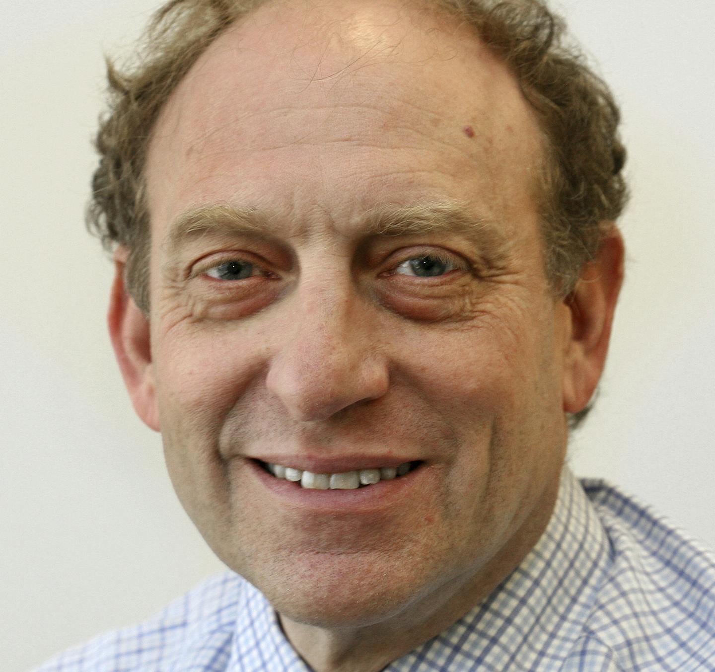 FILE - In this March 18, 2015 file photo, former Associated Press Vice President and Senior Managing Editor Michael Oreskes poses for a photo at AP headquarters, in New York. Oreskes was accused of inappropriate behavior or sexual harassment by at least four women while at The New York Times, NPR and The Associated Press. He has been ousted from NPR. (AP Photo/Chuck Zoeller, File)